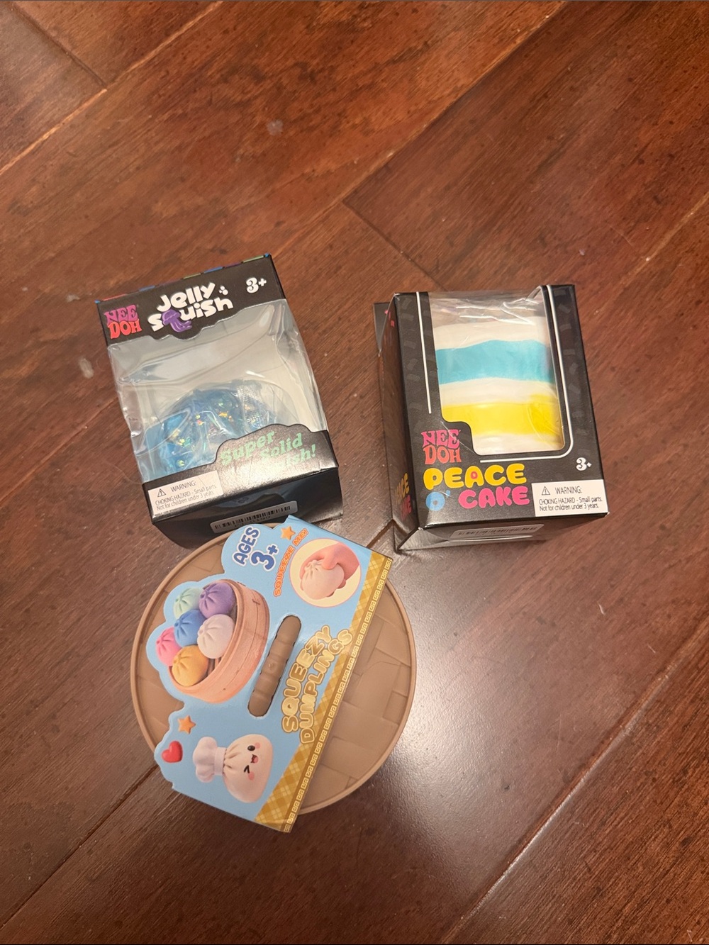 NeeDoh Bundle- peace Cake, jelly Squish and a bun